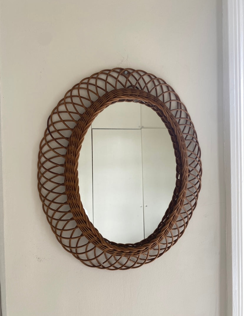 Vintage wicker oval mirror