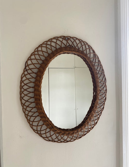 Vintage wicker oval mirror